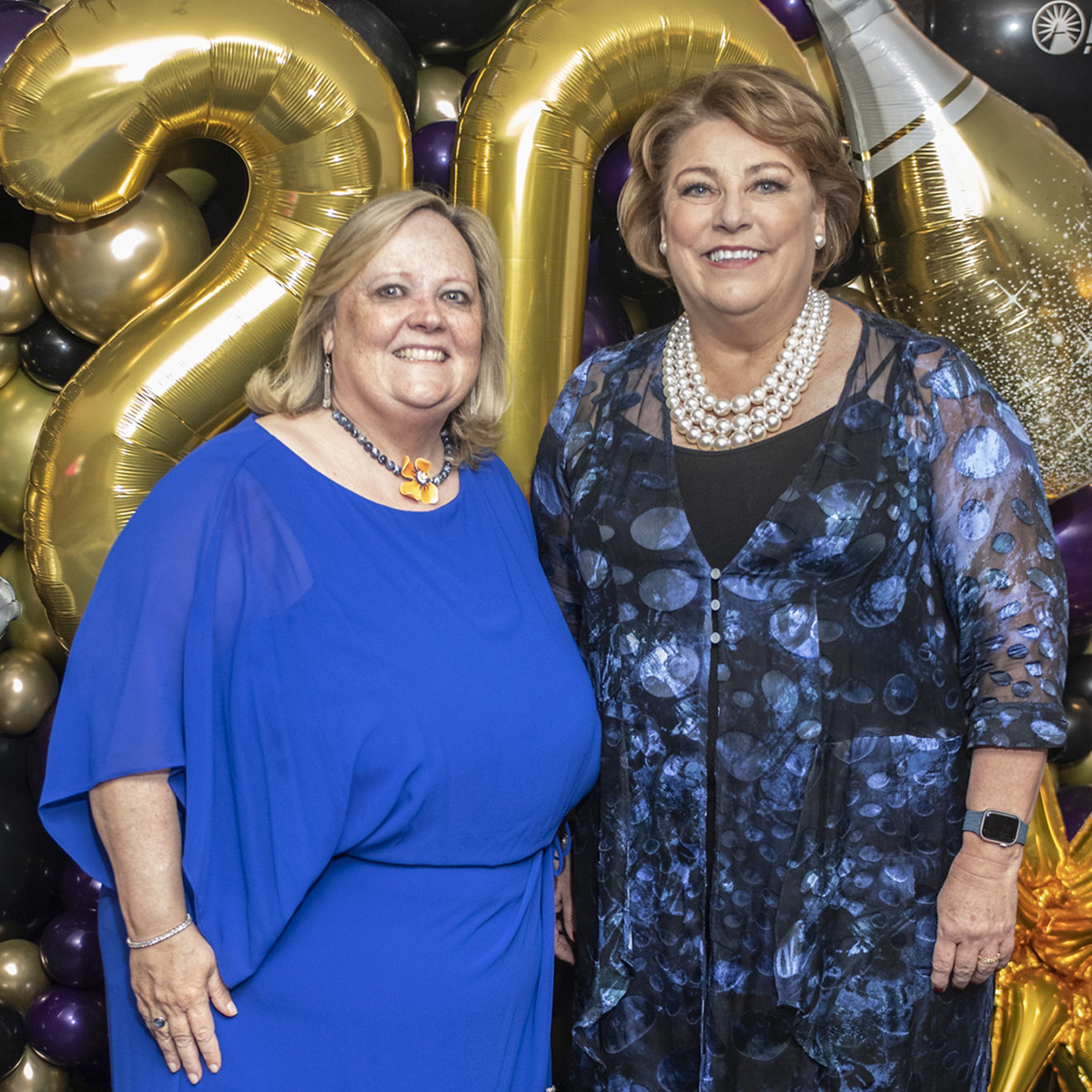 two womens standing