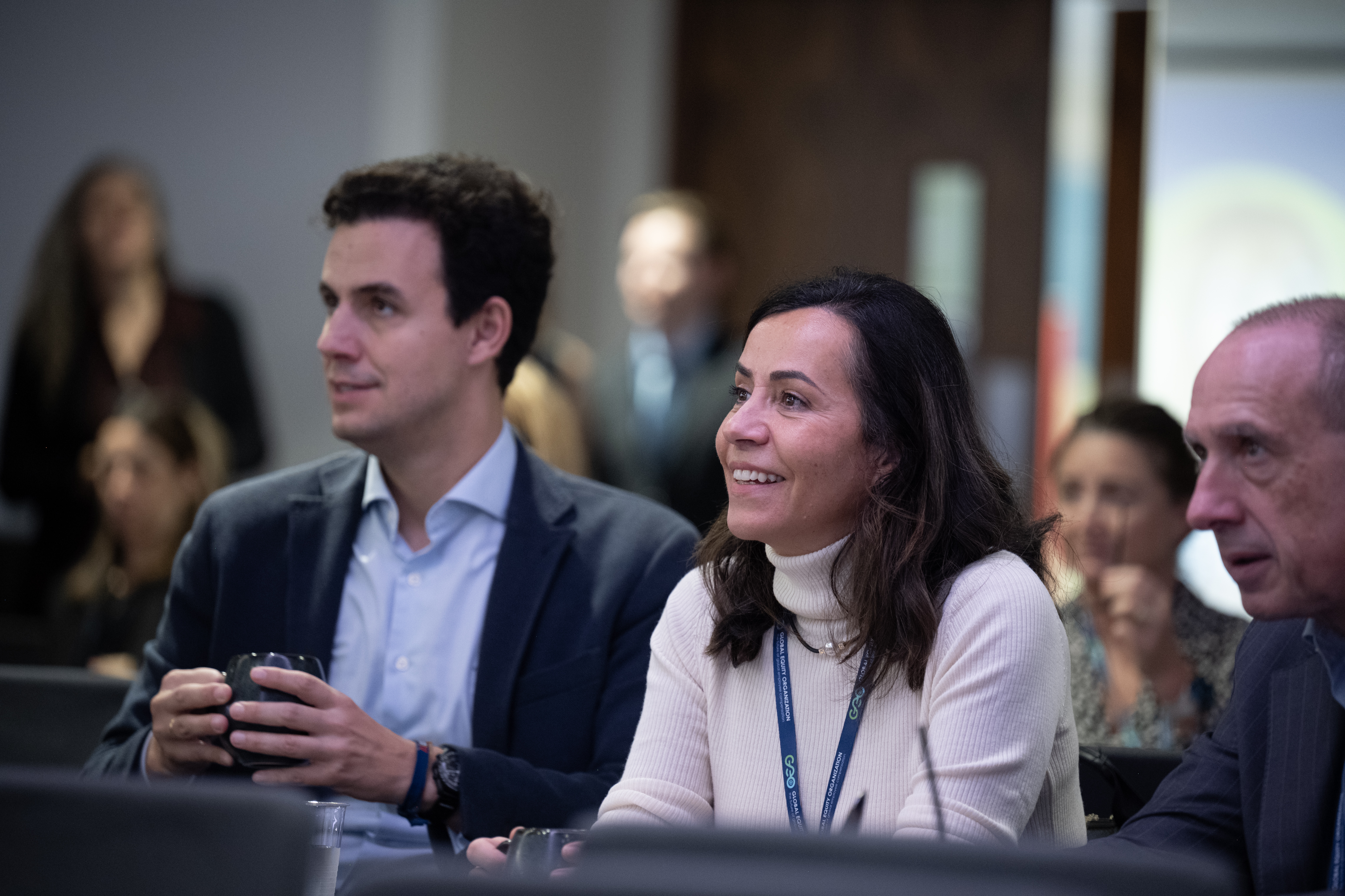SMILING ATTENDEES