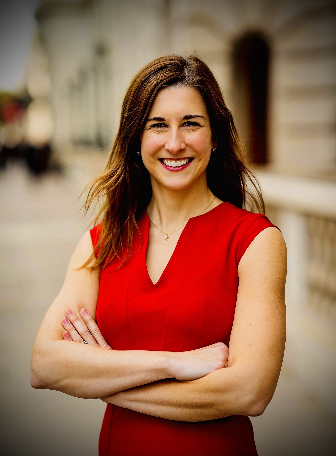 lady in red dress smiling