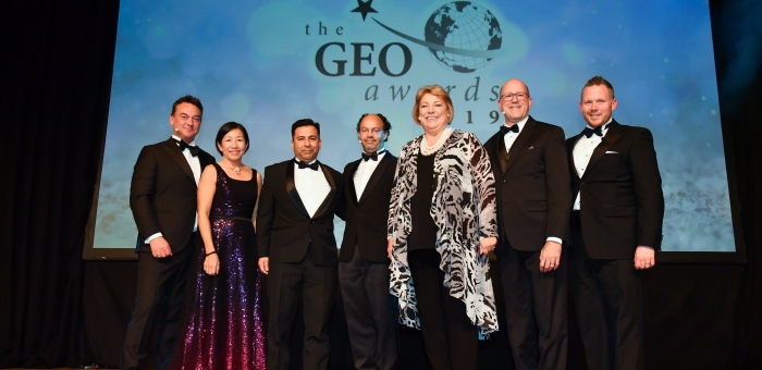 Award winners standing on stage