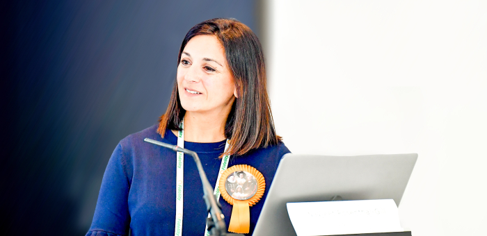 woman at podium